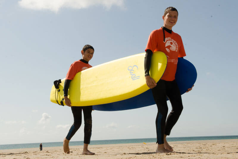 English students after a surf lesson