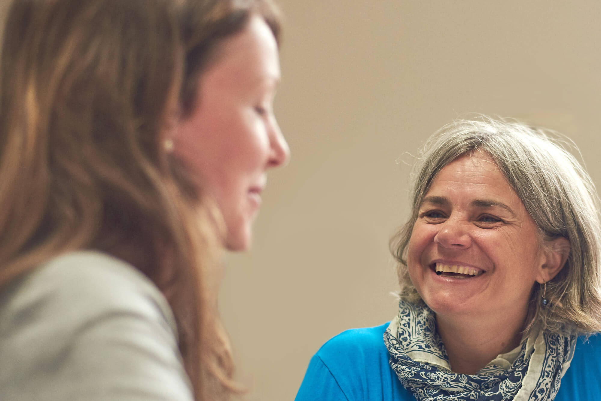 Adult intensive English course students interacting in Jersey, UK