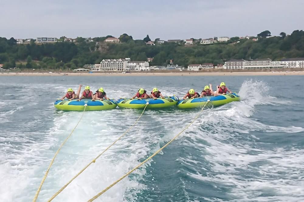 Inflatable rides at St Brelade's bay